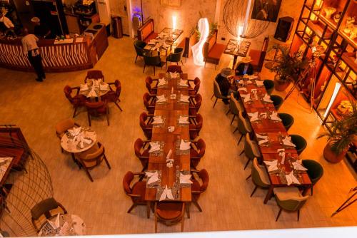 an overhead view of a restaurant with tables and chairs at Emboita Hotel Limited in Nakuru