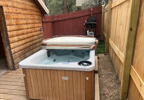a jacuzziificialificialificialificialificialificialificialificialificialificialificial at Canyon Cabins in Ruidoso