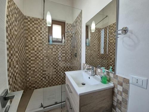 Ένα μπάνιο στο Ossuna Seaview Door