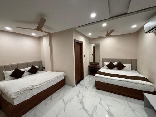 Katil atau katil-katil dalam bilik di Hotel Golden Time