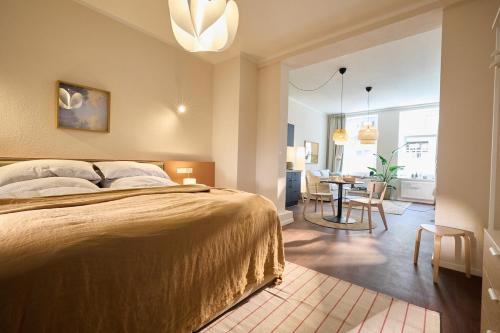 Postel nebo postele na pokoji v ubytování Little Loft im Herzen Schwerins