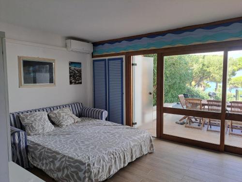 Кровать или кровати в номере Vaccagia - 2 chambres - a 2 pas de la plage