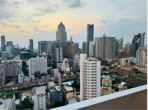 a view of a city skyline with buildings at Omni Tower Nana- Fully Furnished Apartments Bangkok in Ban Nong Chaeng