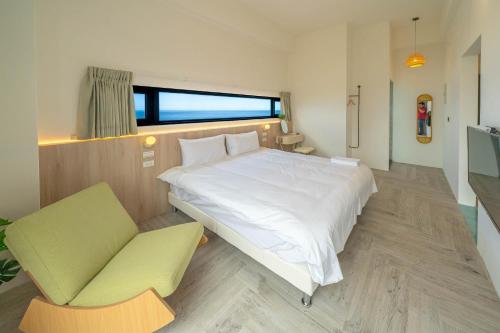 Cama o camas de una habitación en 冉冉七星潭海景民宿