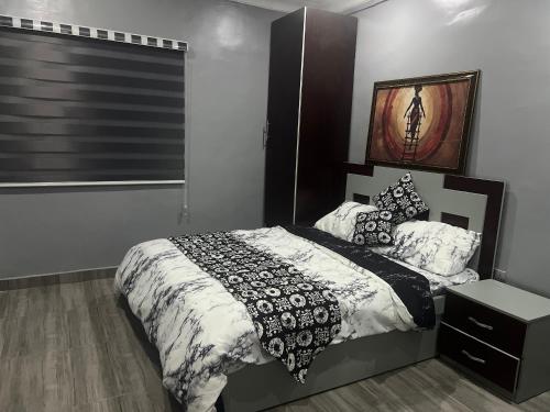 Llit o llits en una habitació de Podium Empire