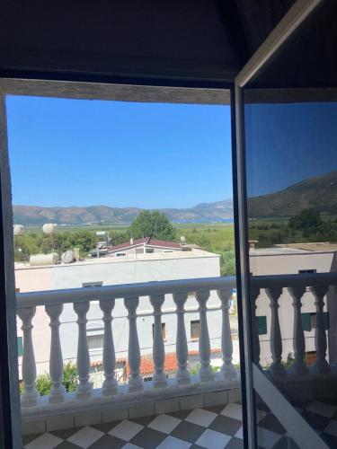 a balcony with a view of a building at Nitro Inn Orikum - SEA and GARDEN in Orikum