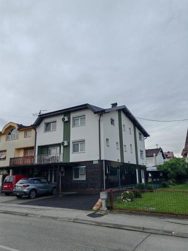 a large building on the side of a street at Vila Nika in Banja Luka