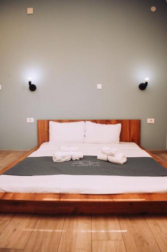 AGH Elite Apartments & Studiosにあるベッド
