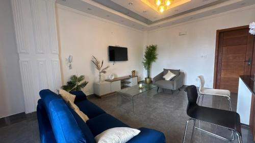TV a/nebo společenská místnost v ubytování Tchinda Meli Residence