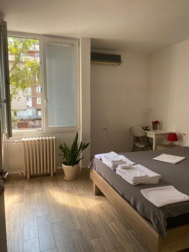 Llit o llits en una habitació de Lotus 28