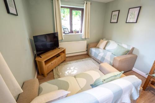 Μια τηλεόραση ή/και κέντρο ψυχαγωγίας στο 2 Bed, Ground Floor Flat, Carlisle