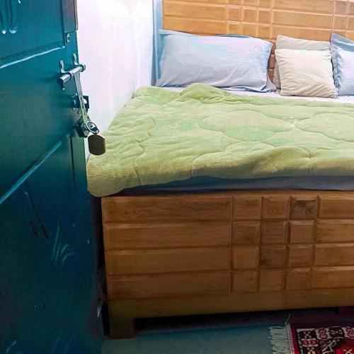 Cama o camas de una habitación en mayur homestay