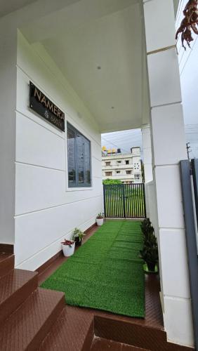 Taman di luar NAMERA Serviced Apartments