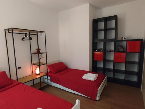 Ένα ή περισσότερα κρεβάτια σε δωμάτιο στο Casa Domotica