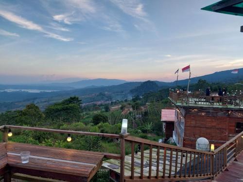 a balcony with a view of the mountains at Varvara hill in Cigugur