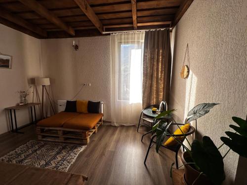 Un lugar para sentarse en "White House Nakani" - Guesthouse near the centre