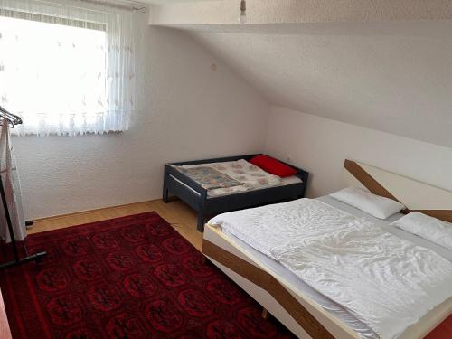 Ένα ή περισσότερα κρεβάτια σε δωμάτιο στο House Crkvina