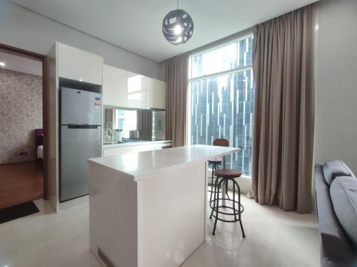 Cuisine ou kitchenette dans l'établissement Soho Suites KL City Centre