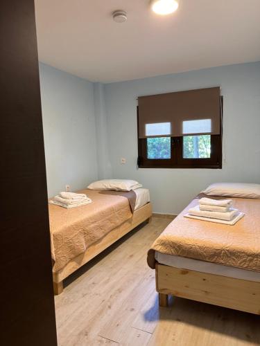 Katil atau katil-katil dalam bilik di Arcobaleno Seaside Escape