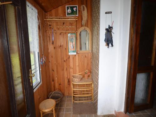 a hallway of a house with a room with a door at Home with Garden & BBQ in Všelibice