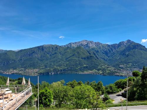 a view of a lake and mountains at Hotel Mirabeau in Bellagio