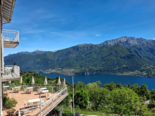 a view of a lake and mountains from a building at Hotel Mirabeau in Bellagio