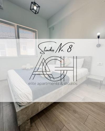 AGH Elite Apartments & Studiosにあるベッド