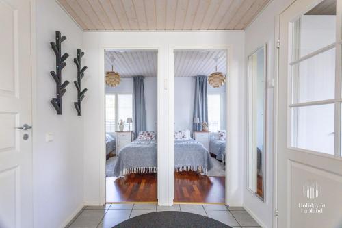 Ένα ή περισσότερα κρεβάτια σε δωμάτιο στο Holiday in Lapland - Leviraitti 14 B6