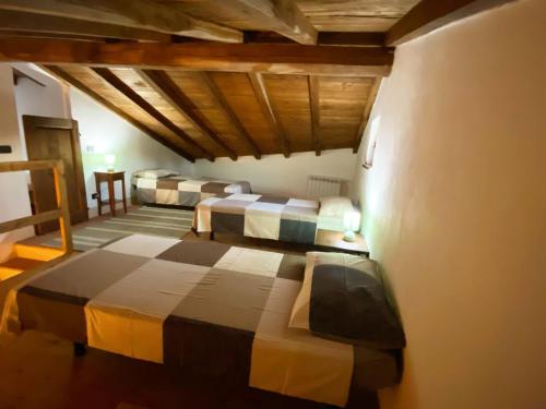 Ένα ή περισσότερα κρεβάτια σε δωμάτιο στο Fattoria San Rocco