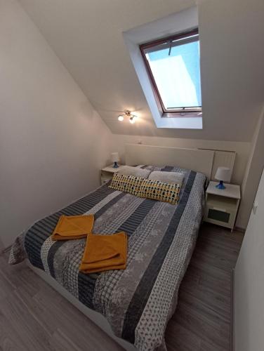 Un ou plusieurs lits dans un hébergement de l'établissement Solid Apartmans