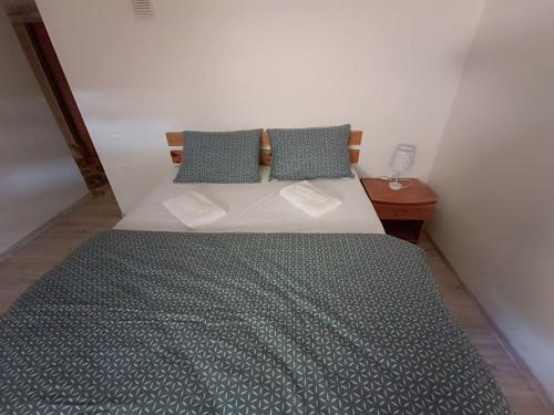 Ένα ή περισσότερα κρεβάτια σε δωμάτιο στο Julia's Apartment