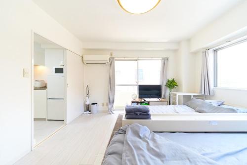 Postel nebo postele na pokoji v ubytování Maison Junes 21