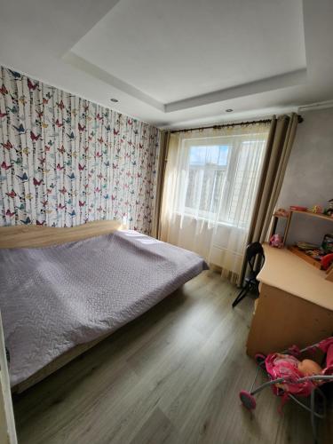 Postel nebo postele na pokoji v ubytování Luks
