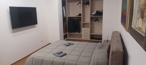 En eller flere senge i et værelse på Casa Cristina