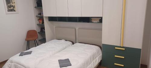 En eller flere senge i et værelse på Casa Cristina