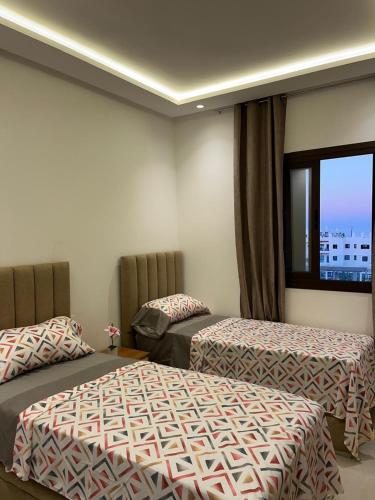 Katil atau katil-katil dalam bilik di Perfect Summer Apartment