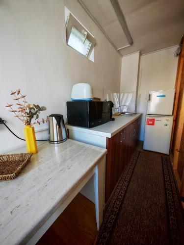 Dapur atau dapur kecil di YNA - Self Check-In Stay