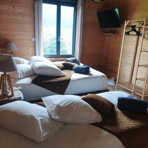 Chalet Bois le Havre du sotrè Gérardmer Sauna panoramique jacuzzi 14 personnes et 1 bébé