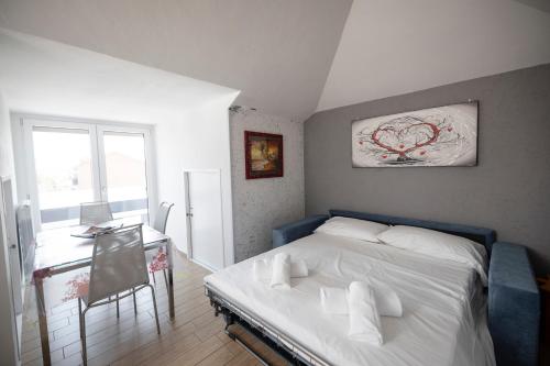 Letto o letti in una camera di Splendido Bilocale a Nerviano