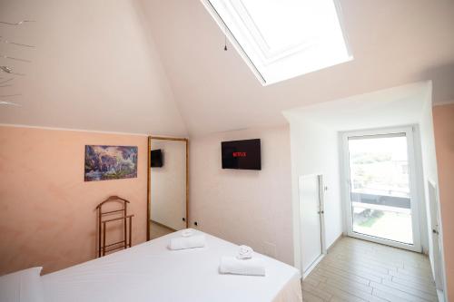 Letto o letti in una camera di Splendido Bilocale a Nerviano