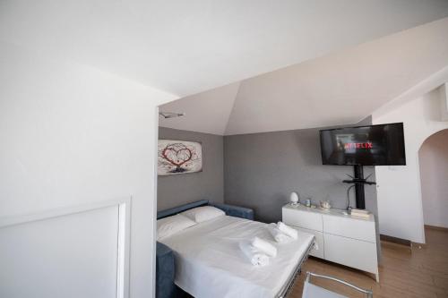 Letto o letti in una camera di Splendido Bilocale a Nerviano