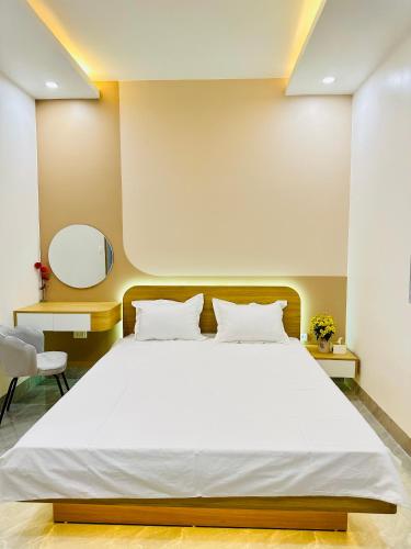 Ένα ή περισσότερα κρεβάτια σε δωμάτιο στο Thu Ha Homestay - VTĐ7-61 - Vinhomes Ocean Park 3