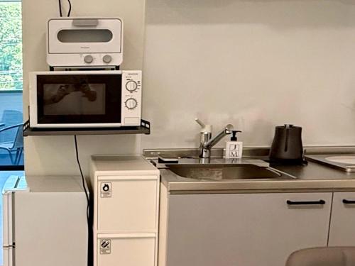 Una cocina o zona de cocina en 加美屋リゾート長瀞岩畳リバーサイドテラスSuite