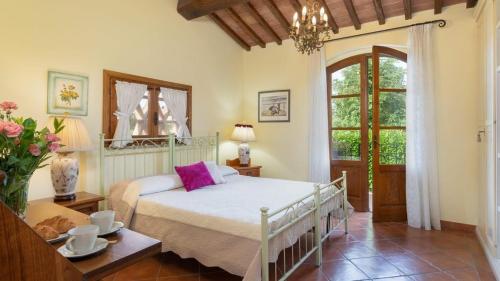 Ένα ή περισσότερα κρεβάτια σε δωμάτιο στο Villa Aldeia I Relax & Charm with Private Pool