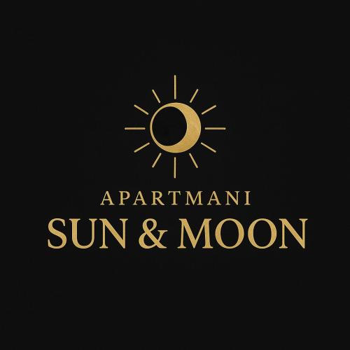 a gold sun and moon logo on a black background at Apartmani Sun & Moon in Žepče