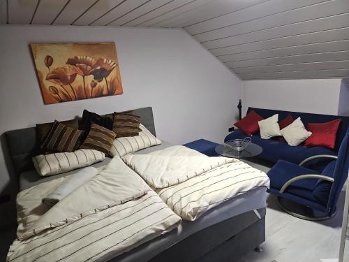 Cama o camas de una habitación en Ferienhaus Petzenblick