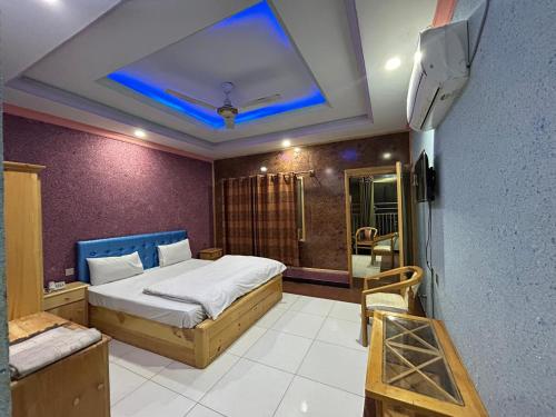 Katil atau katil-katil dalam bilik di Glorious Continental Hotel