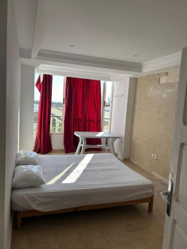 Ένα ή περισσότερα κρεβάτια σε δωμάτιο στο Duplex with Unobstructed Sea View Sidi Bou Saïd