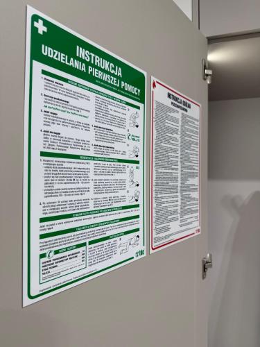 a poster on the wall of a hospital at CASHMERE Apartment - Airport Katowice-Pyrzowice in Siewierz