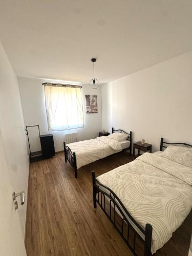 Giường trong phòng chung tại Le Loft du bonheur